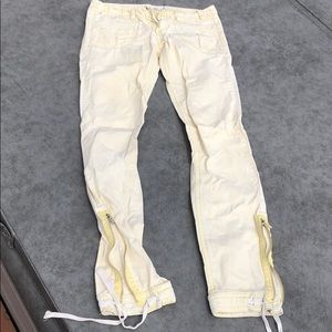 Yellow Pure Oxygen pants w zipper at bottom